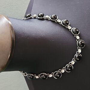 WHBM short necklace with black gemstones and clear crystals.